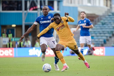 031026 - Gillingham v Newport County - Sky Bet League 2 - Michael Adu-Poku of Newport County and Omar Beckles of Gillingham in action