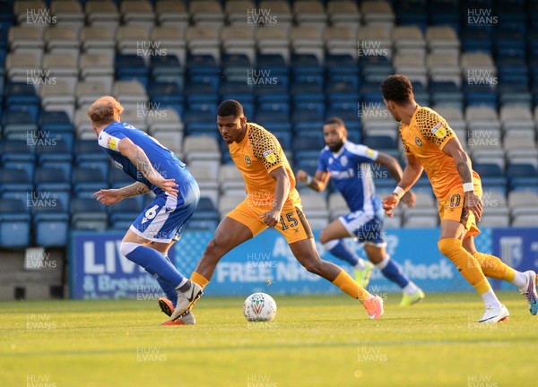 130819 - Gillingham v Newport County - Carabao Cup 1st Round -  Tristan Abrahams of Newport takes on the Gillingham defence