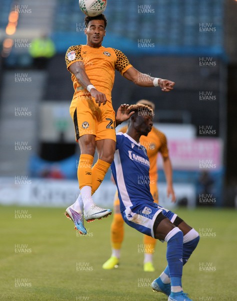 130819 - Gillingham v Newport County - Carabao Cup 1st Round -  Corey Whitely heads away for Newport