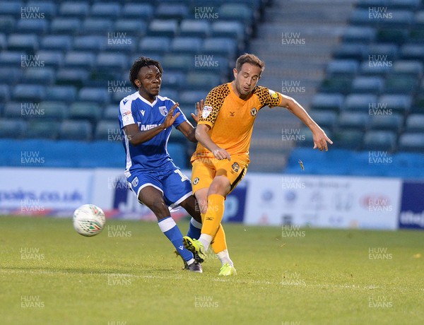 130819 - Gillingham v Newport County - Carabao Cup 1st Round -  Matty Dolan clears for Newport