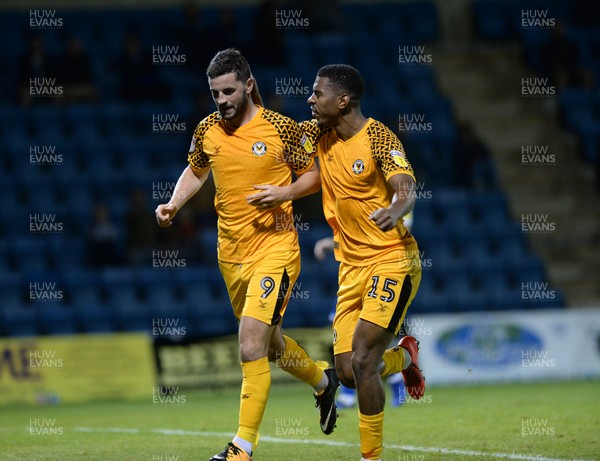 130819 - Gillingham v Newport County - Carabao Cup 1st Round -  Newport's Tristan Abrahams and Padraig Amond celebrate after Amond made it 2-2 from the penalty spot