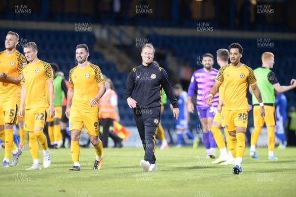 130819 - Gillingham v Newport County - Carabao Cup 1st Round -  Newport celebrate with manager Michael Flynn after the game