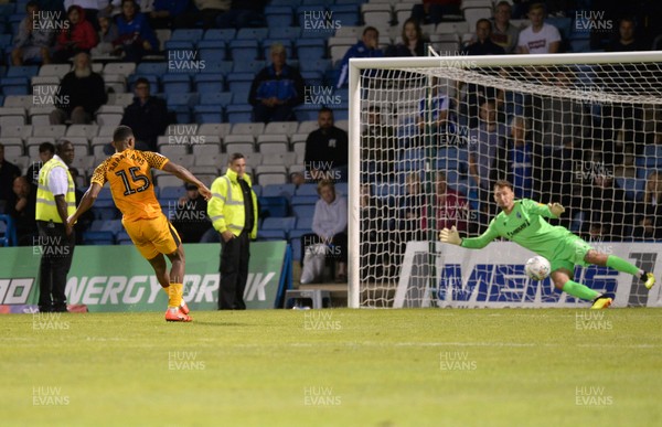 130819 - Gillingham v Newport County - Carabao Cup 1st Round -  Newport's Tristan Abrahams scores the winning penalty in the shootout