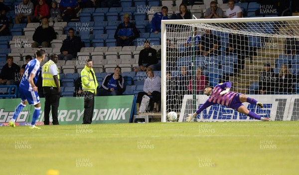 130819 - Gillingham v Newport County - Carabao Cup 1st Round -  Newport goalkeeper Nick Townsend saves in the penalty shootout