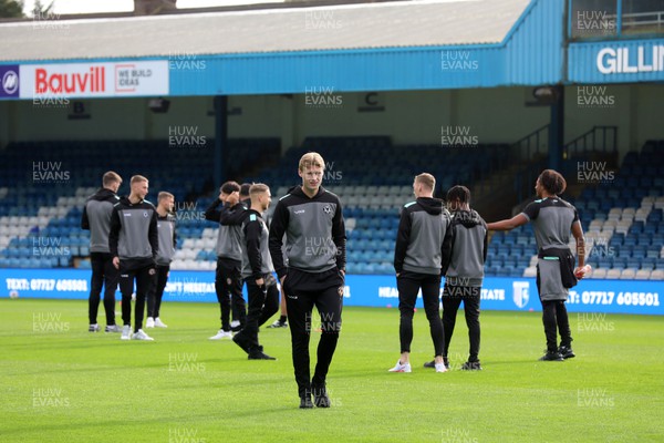 281023 - Gillingham v Newport County - Sky Bet League 2 - Newport players test out the pitch