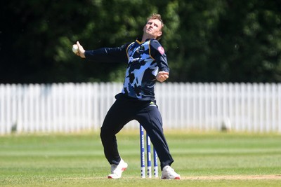 140525 - Glamorgan 2nd XI v Cardiff UCCE - T20 Blast Friendly - Tom Bevan of Glamorgan bowling