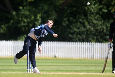 140525 - Glamorgan 2nd XI v Cardiff UCCE - T20 Blast Friendly - Tom Bevan of Glamorgan bowling
