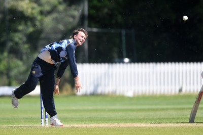 140525 - Glamorgan 2nd XI v Cardiff UCCE - T20 Blast Friendly - Tom Bevan of Glamorgan bowling