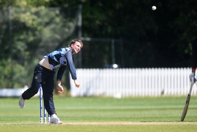 140525 - Glamorgan 2nd XI v Cardiff UCCE - T20 Blast Friendly - Tom Bevan of Glamorgan bowling