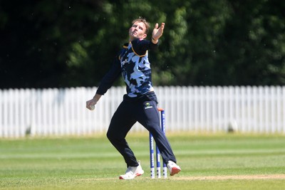 140525 - Glamorgan 2nd XI v Cardiff UCCE - T20 Blast Friendly - Tom Bevan of Glamorgan bowling