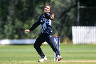 140525 - Glamorgan 2nd XI v Cardiff UCCE - T20 Blast Friendly - Tom Bevan of Glamorgan bowling