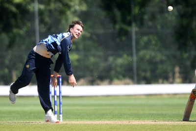 140525 - Glamorgan 2nd XI v Cardiff UCCE - T20 Blast Friendly - Tom Bevan of Glamorgan bowling