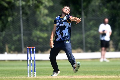 140525 - Glamorgan 2nd XI v Cardiff UCCE - T20 Blast Friendly - Tom Norton of Glamorgan bowling