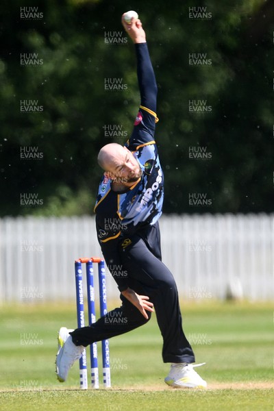 140525 - Glamorgan 2nd XI v Cardiff UCCE - T20 Blast Friendly - Jamie Mcllroy of Glamorgan bowling