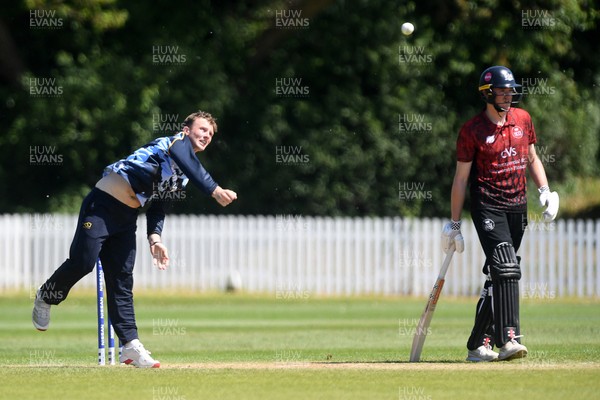 140525 - Glamorgan 2nd XI v Cardiff UCCE - T20 Blast Friendly - Tom Bevan of Glamorgan bowling