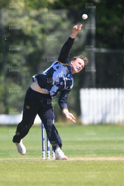 140525 - Glamorgan 2nd XI v Cardiff UCCE - T20 Blast Friendly - Tom Bevan of Glamorgan bowling