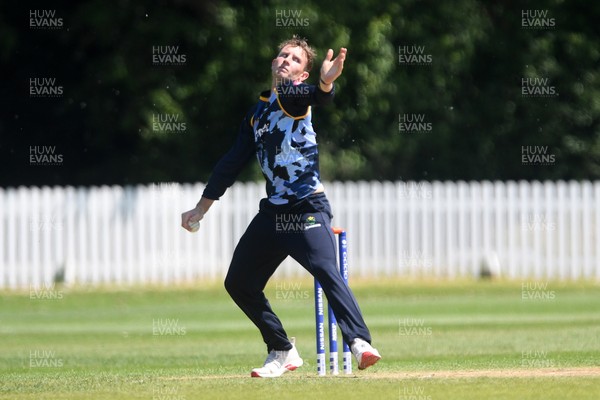 140525 - Glamorgan 2nd XI v Cardiff UCCE - T20 Blast Friendly - Tom Bevan of Glamorgan bowling