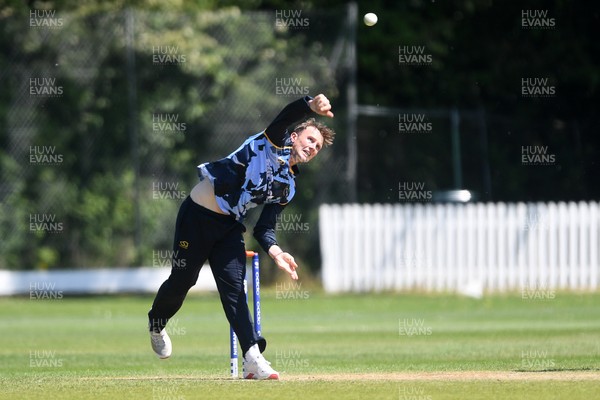 140525 - Glamorgan 2nd XI v Cardiff UCCE - T20 Blast Friendly - Tom Bevan of Glamorgan bowling