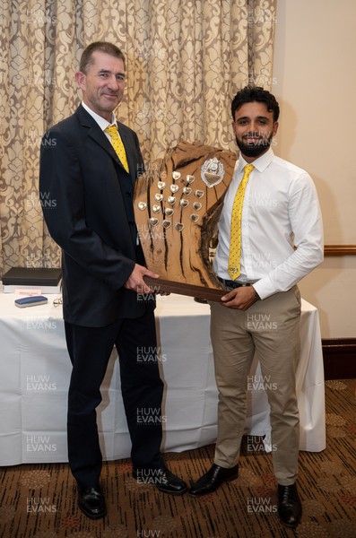 041023 - Glamorgan Cricket Club and St Helen’s Balconiers Combined Annual Awards Dinner, Towers Hotel, Swansea - Steve Watkin presents the Glamorgan Young Player of the Year award to Zain ul Hassan 