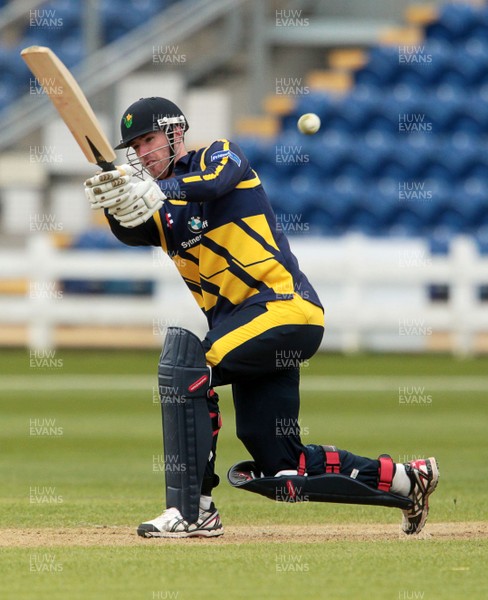 240314 - Glamorgan CCC v Cardiff MCCU - Preseason Friendly - John Glover of Glamorgan bats