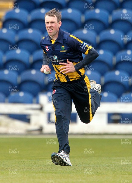 240314 - Glamorgan CCC v Cardiff MCCU - Preseason Friendly - Huw Waters of Glamorgan bowls