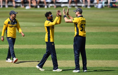 190822 - Glamorgan v Hampshire - Royal London Cup - Prem Sisodiya of Glamorgan celebrates the wicket of Keith Barker of Hampshire