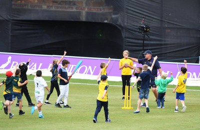 190822 - Glamorgan v Hampshire - Royal London Cup - Children play on the outfield during the break