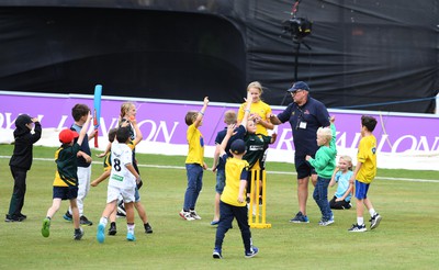 190822 - Glamorgan v Hampshire - Royal London Cup - Children play on the outfield during the break