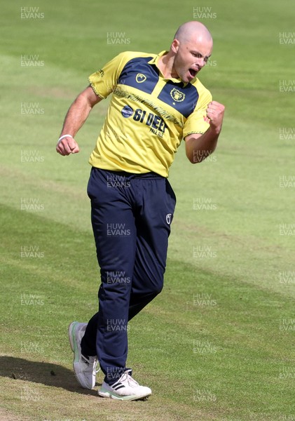 300820 - Glamorgan Cricket v Birmingham Bears - Vitality T20 Blast - Jake Lintott of Birmingham celebrates as Marchant de Lange is caught out