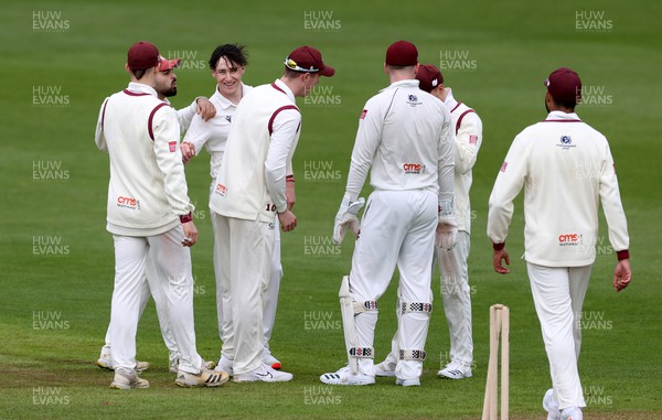 020424 - Glamorgan v Cardiff UCCE - Pre Season Friendly - Joe Davies of Cardiff celebrates after bowling Harry Podmore of Glamorgan out for LBW