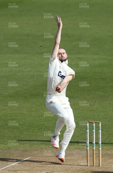 300321 Glamorgan v Cardiff UCCE, Pre-season Friendly - Jamie McIlroy of Glamorgan bowls