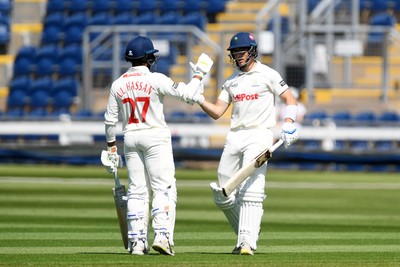 020525 - Glamorgan v Derbyshire - Rothesay County Championship - Zain Ul-Hassan congratulates Asa Tribe of Glamorgan after hitting 50