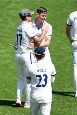020525 - Glamorgan v Derbyshire - Rothesay County Championship - Luis Reece of Derbyshire celebrates with team mates after bowling out Asa Tribe of Glamorgan