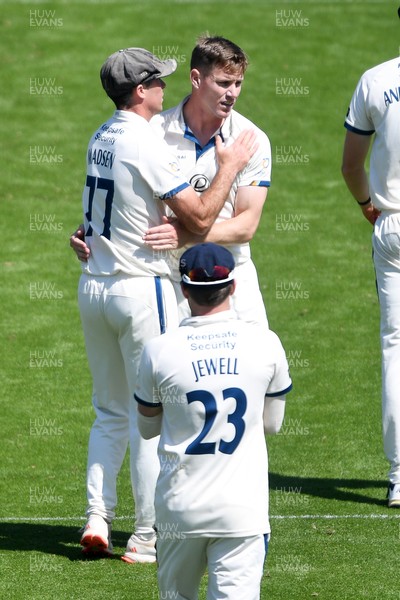 020525 - Glamorgan v Derbyshire - Rothesay County Championship - Luis Reece of Derbyshire celebrates with team mates after bowling out Asa Tribe of Glamorgan