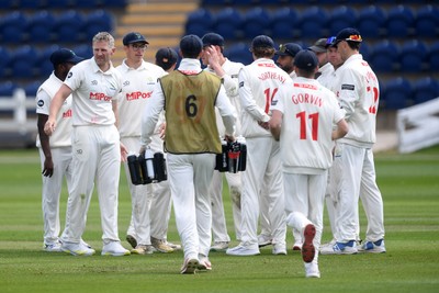 040525 - Glamorgan v Derbyshire - Rothesay County Championship - Timm Van Der Gugten of Glamorgan celebrates taking the wicket of Alex Thomson of Derbyshire with teammates