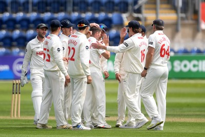 040525 - Glamorgan v Derbyshire - Rothesay County Championship - Andy Gorvin of Glamorgan celebrates taking the wicket of Zak Chappell of Derbyshire with teammates