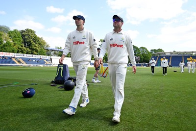 040525 - Glamorgan v Derbyshire - Rothesay County Championship - Ned Leonard and Colin Ingram of Glamorgan leaves the field to take lunch
