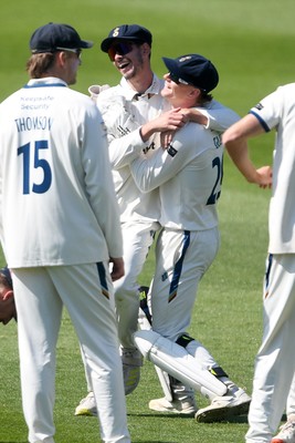 040525 - Glamorgan v Derbyshire - Rothesay County Championship - Sam Northeast of Glamorgan is bowled out by Anuj Dal of Derbyshire and celebrates with team mates