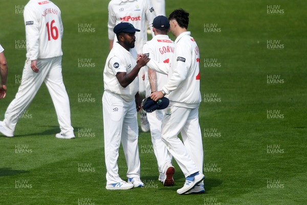 040525 - Glamorgan v Derbyshire - Rothesay County Championship - Asitha Fernando of Glamorgan bowls out Blair Tickner of Derbyshire to take the last wicket
