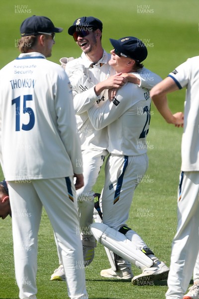 040525 - Glamorgan v Derbyshire - Rothesay County Championship - Sam Northeast of Glamorgan is bowled out by Anuj Dal of Derbyshire and celebrates with team mates