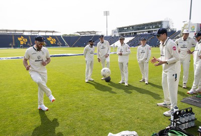 120424 - Glamorgan v Derbyshire - Vitality County Championship, Division Two - David Lloyd and Aneurin Donald of Derbyshire play football before the match