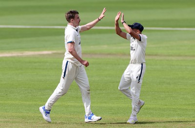 120424 - Glamorgan v Derbyshire - Vitality County Championship, Division Two - Blair Tickner of Derbyshire celebrates taking the wicket of Sam Northeast of Glamorgan