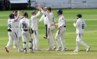 120424 - Glamorgan v Derbyshire - Vitality County Championship, Division 2 - Blair Tickner of Derbyshire celebrates taking the wicket of Sam Northeast of Glamorgan