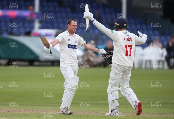120619 - Glamorgan v Derbyshire, Specsavers County Championship Division 2 - Graham Wagg of Glamorgan celebrates with Lukas Carey of Glamorgan as he reaches his 100
