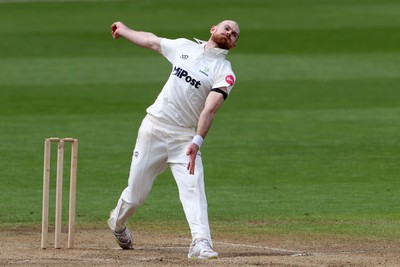 150424 - Glamorgan v Derbyshire - Vitality County Championship, Division Two - James Harris of Glamorgan bowling