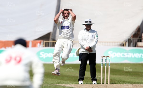 210618 - Glamorgan v Derbyshire - Specsavers County Championship Division Two - Lukas Carey of Glamorgan bowling