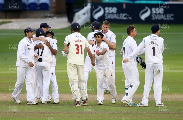 290617 - Glamorgan v Derbyshire - Specsavers County Championship Division Two - Hamidullah Qadri of Derbyshire celebrates shakes hands with Michael Hogan of Glamorgan after Derbyshire win the game