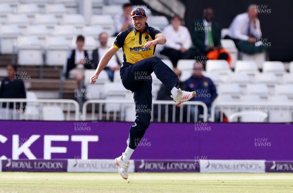 190821 - Glamorgan v Durham - Royal London One Day Final - James Weighell of Glamorgan kicks the ball in celebration as he catches the ball to dismiss David Bedingham
