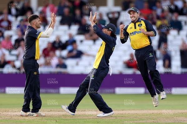 190821 - Glamorgan v Durham - Royal London One Day Final - Steven Reingold of Glamorgan celebrates with Kiran Carlson as Cameron Bancroft is caught by Andy Gorvin