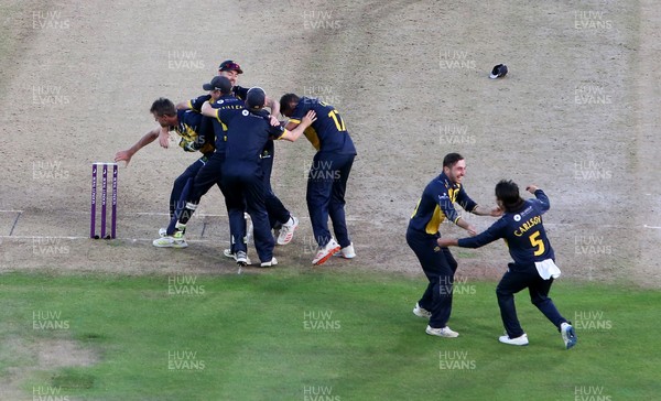 190821 - Glamorgan v Durham - Royal London One Day Final - Michael Hogan of Glamorgan and team mates celebrate as they win the game